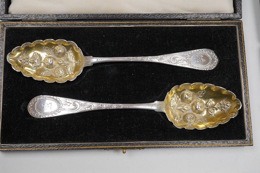 A matched pair of George III silver berry spoons, Dublin, 1808/9, one maker Kelly, the other John Power, 21.5cm, in later fitted case, together with a cased pair of George III Old English pattern berry spoons, London, 17
